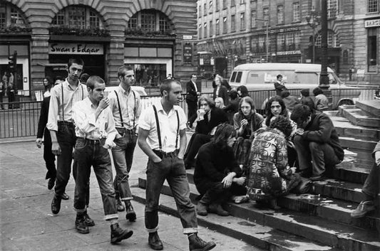 Original skinheads on London streets in 1969 wearing braces, cropped trousers, and polished boots - the authentic Spirit of '69 uniform